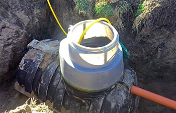 A septic tank being installed.