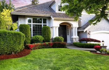 A residential house with maintained backyard.